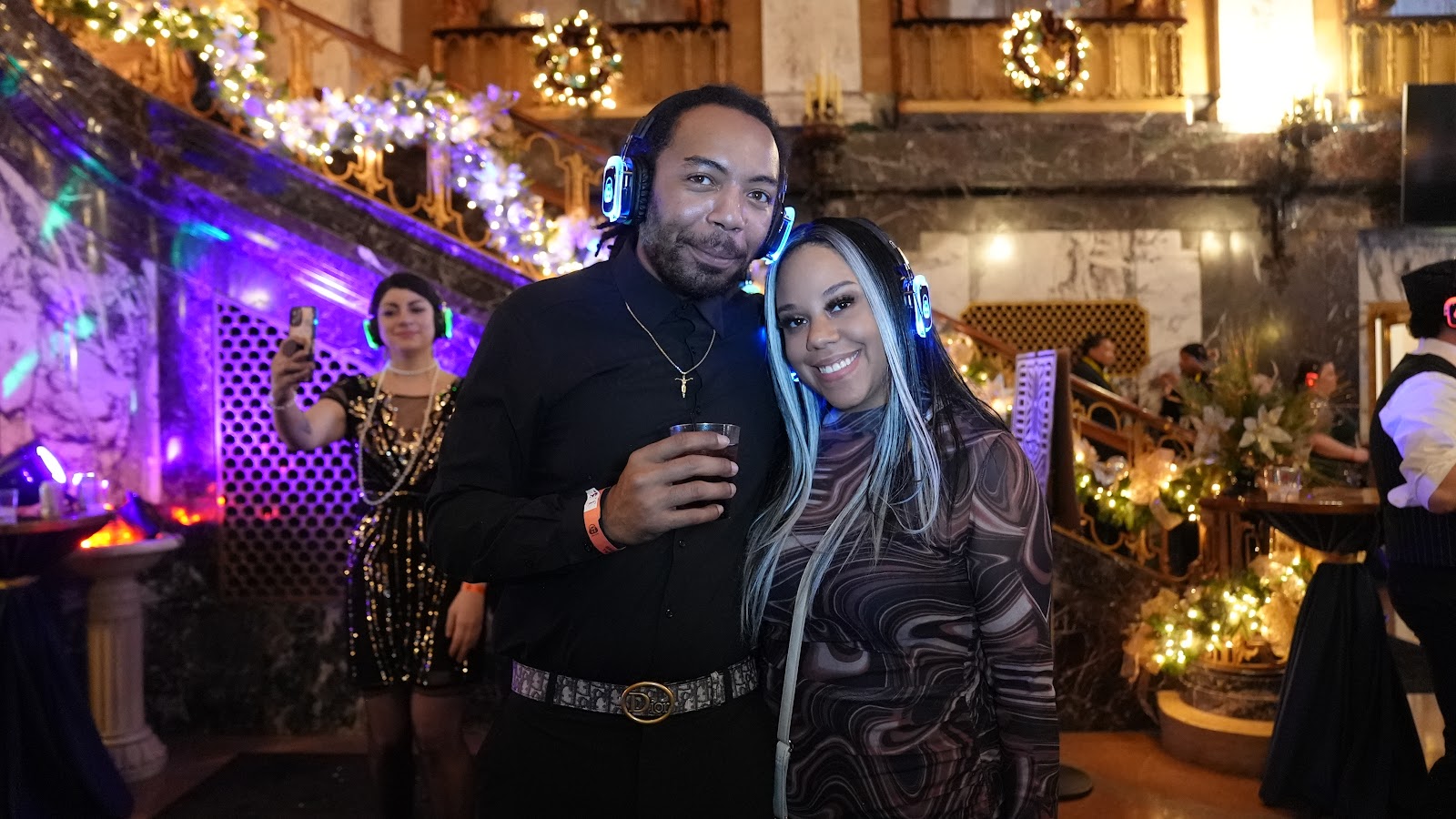 SE2 Silent Disco photo showing guests wearing glowing wireless headphones with music-channel moment, asset 9KYOKD.