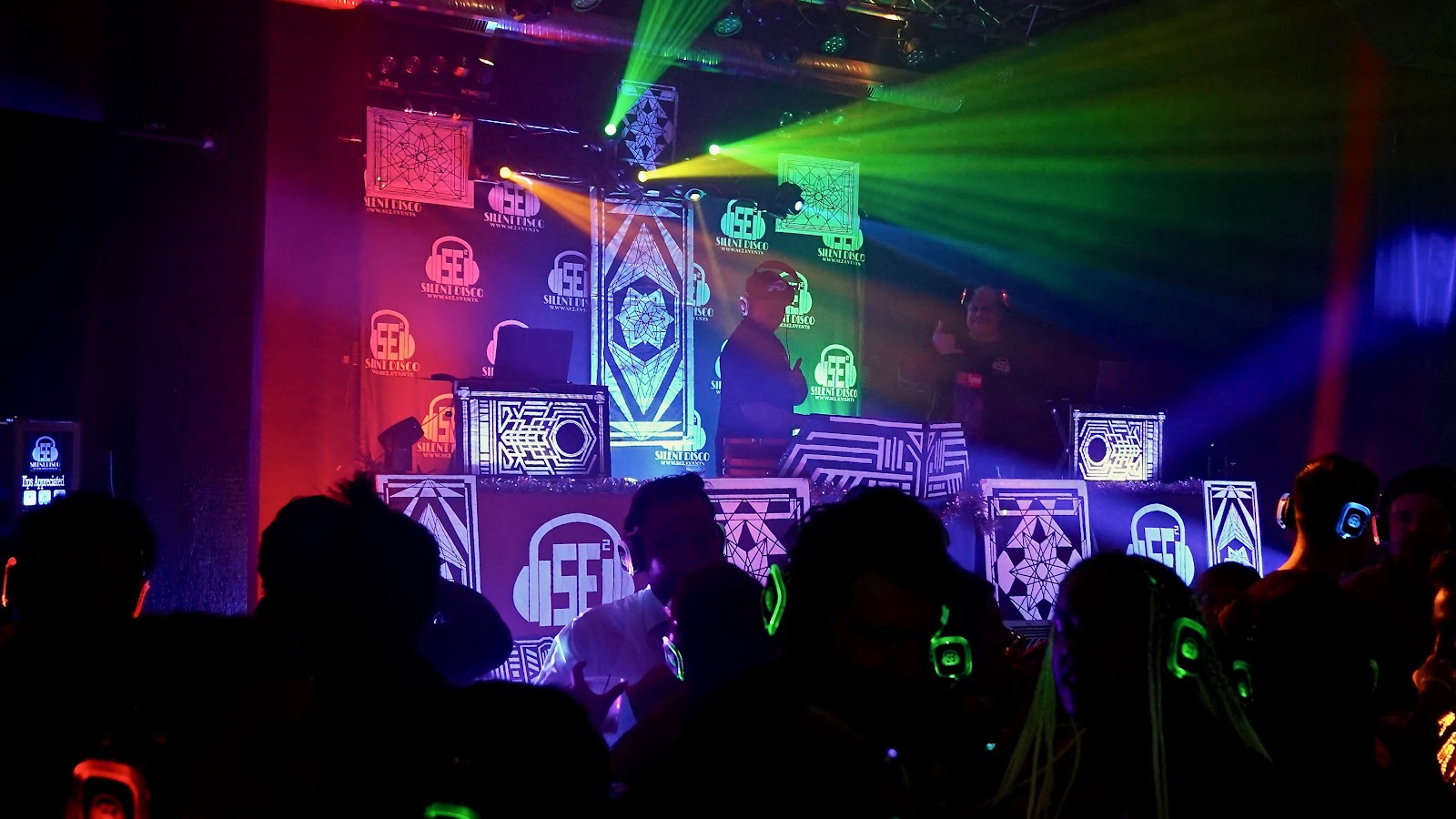 SE2 Silent Disco photo showing an SE2 Silent Disco event moment with party lighting, asset 7SQ0CW.
