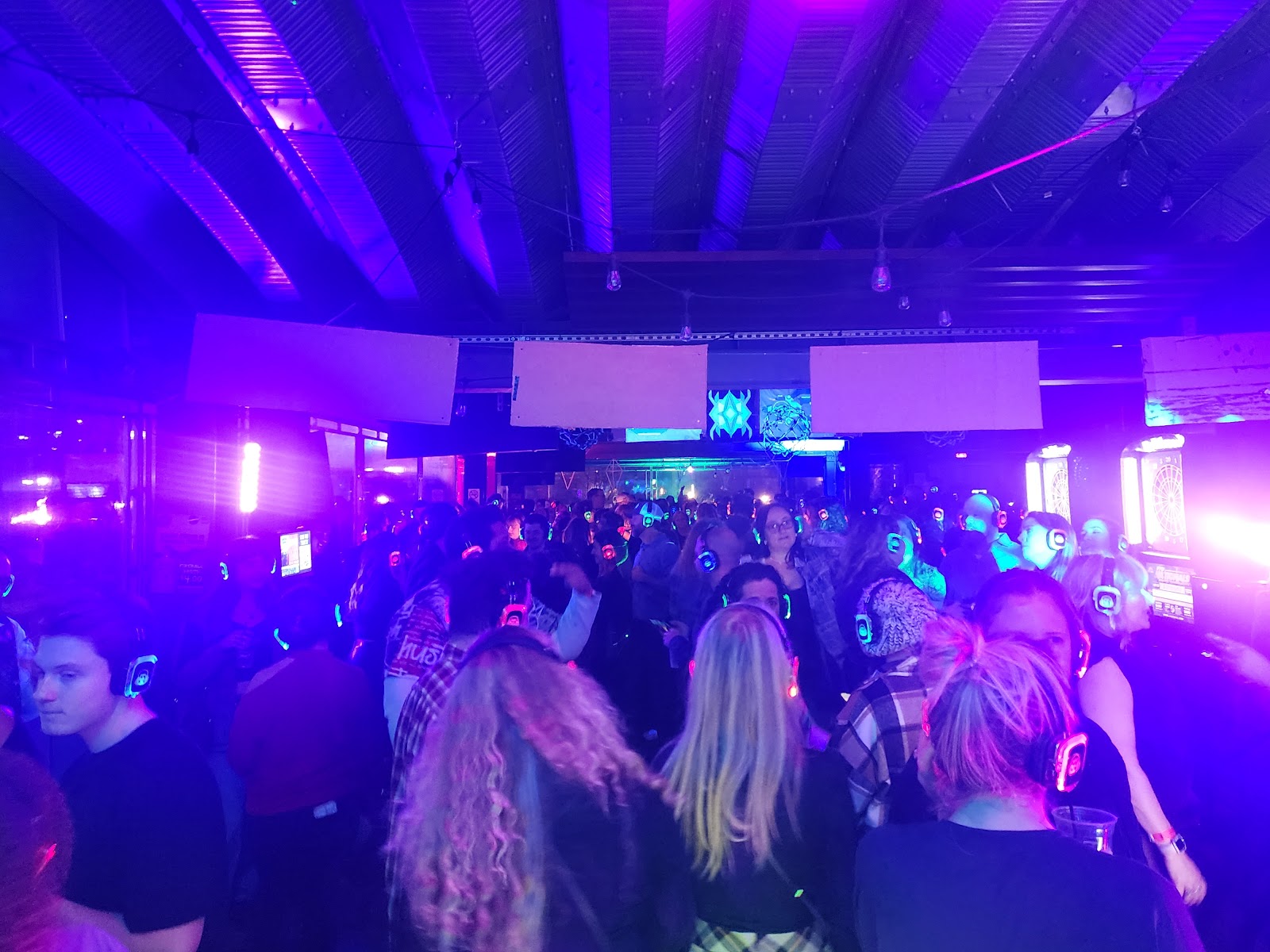 SE2 Silent Disco photo showing a headphone party crowd with music-channel moment, asset S4CYDE.