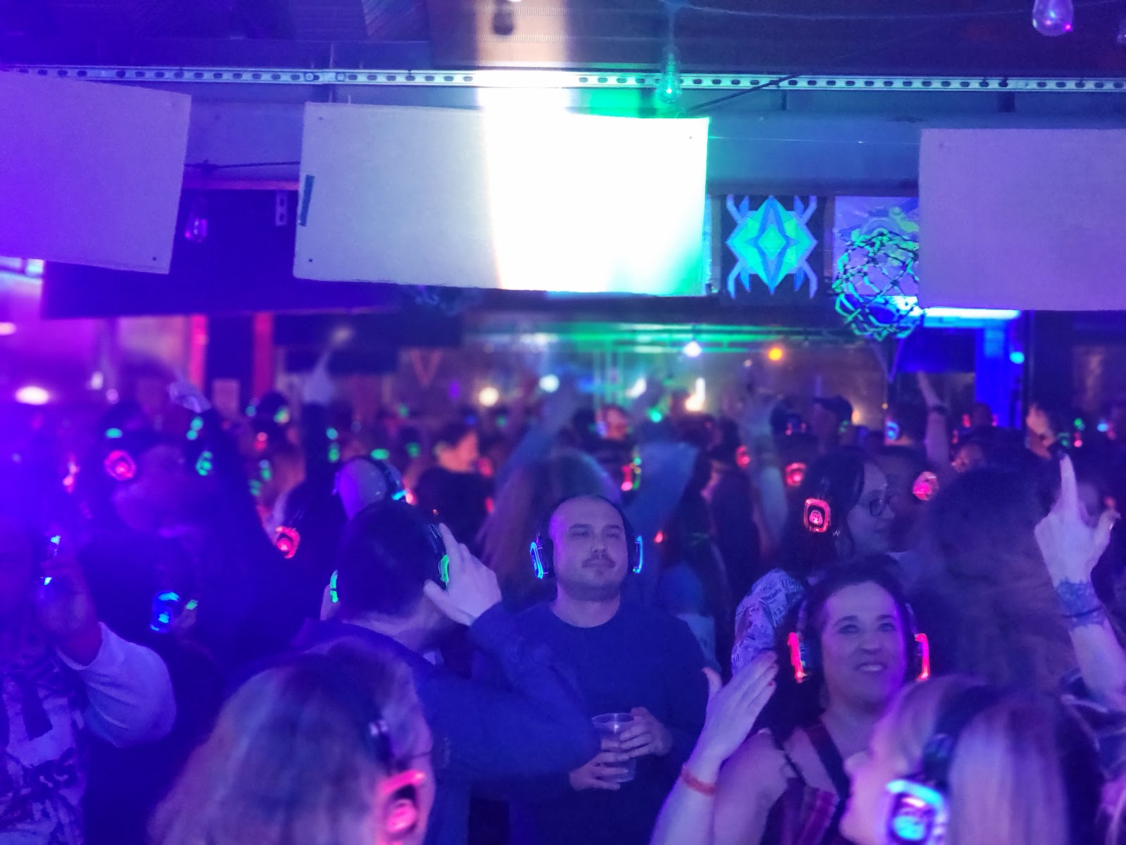 SE2 Silent Disco photo showing a headphone party crowd with dance-floor energy, asset WN6ZFB.