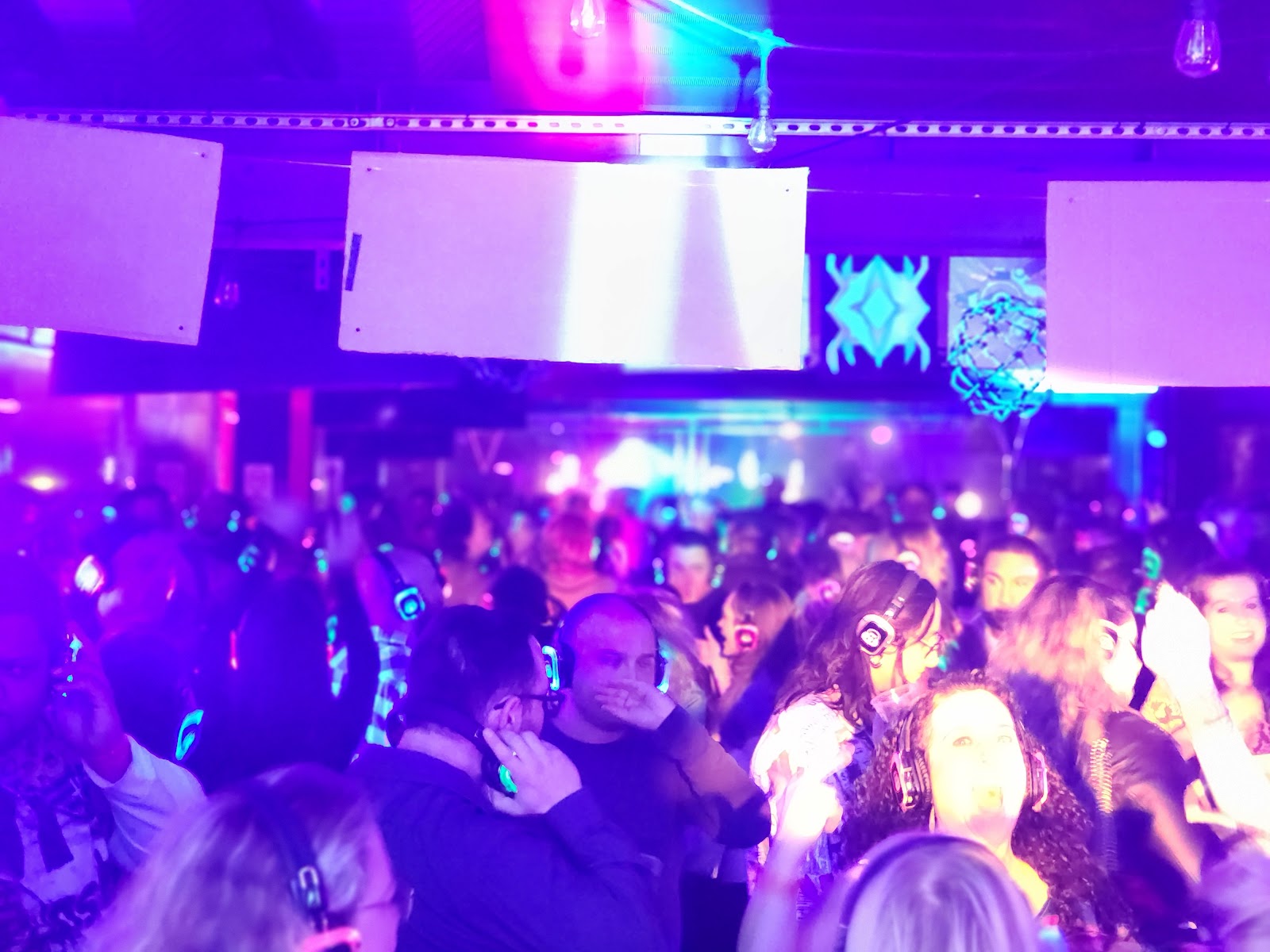SE2 Silent Disco photo showing a headphone party crowd with crowd atmosphere, asset XXUE6N.