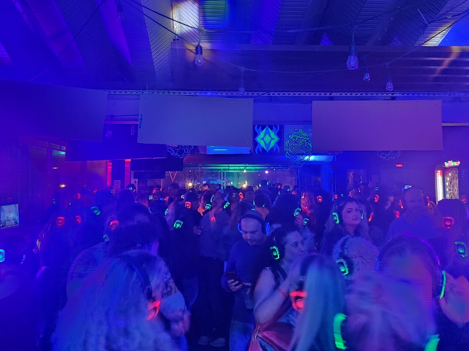 SE2 Silent Disco photo showing glowing headphones and event energy with party lighting, asset S0FPKL.